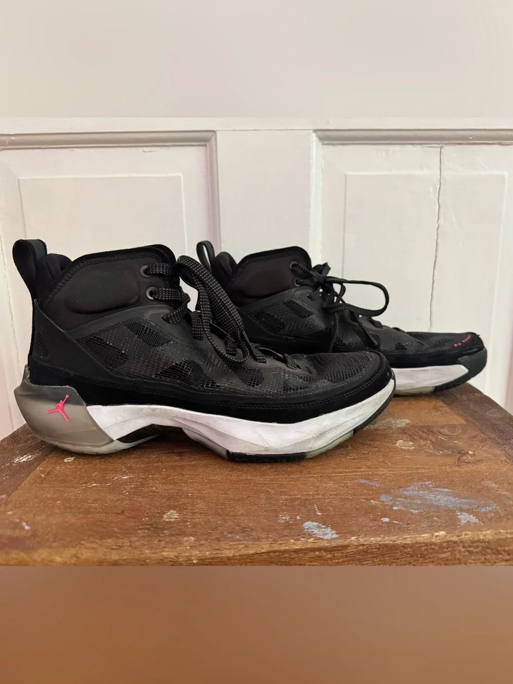 Boy’s Nike Air Jordan XXXVII Black Hot Punch basketball shoes.